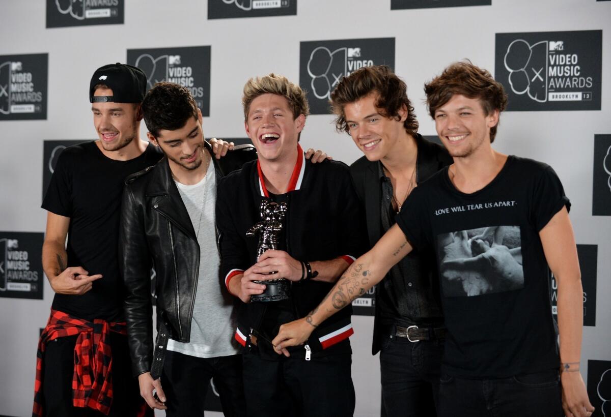 One Direction, shown in August at the MTV Video Music Awards in New York, will interact with fans during "1D Day" on Nov. 23.