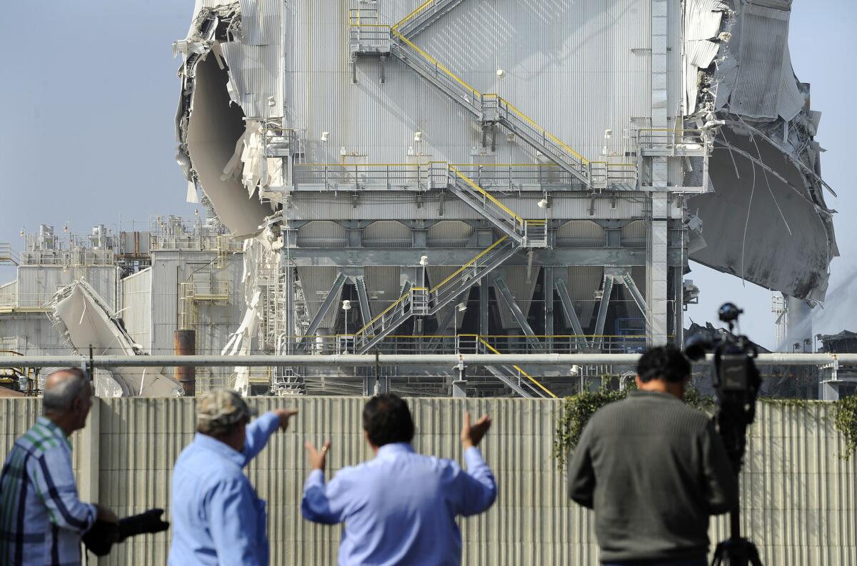 An explosion at the Exxon Mobile refinery in Torrance damaged a pollution control system and forced the plant to reduce operations to 20% of normal production.