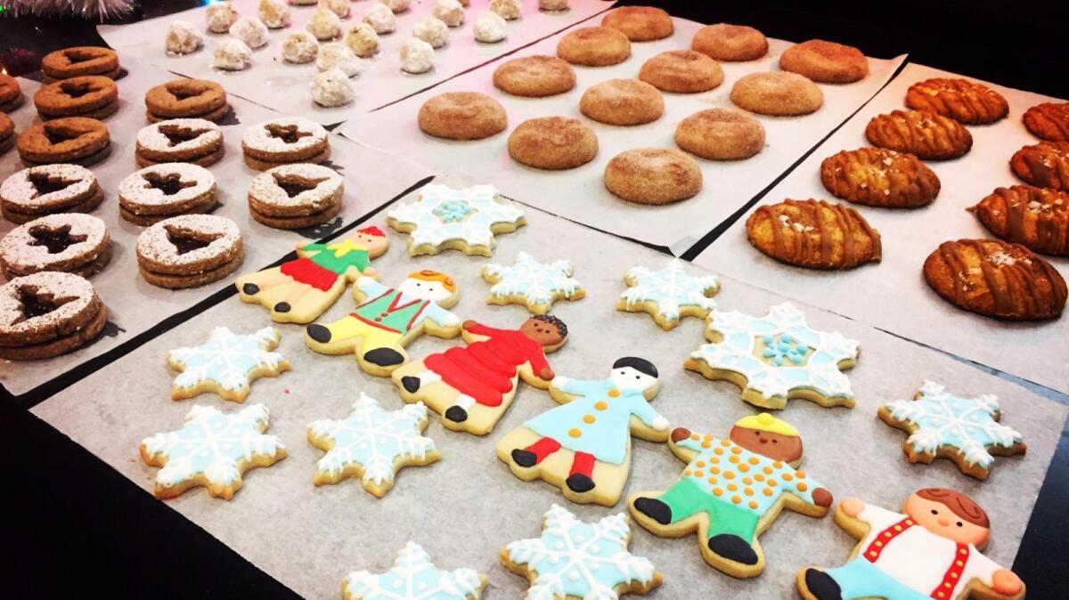 The top five cookies in our L.A. Times Holiday Cookie Bake-Off (clockwise from bottom): Holiday Kids; Linzer Cookies; Rose, Cardamom and Pistachio Snowballs; Mexican Chocolate Christmas Cookies; Salted Caramel Snickerdoodles).
