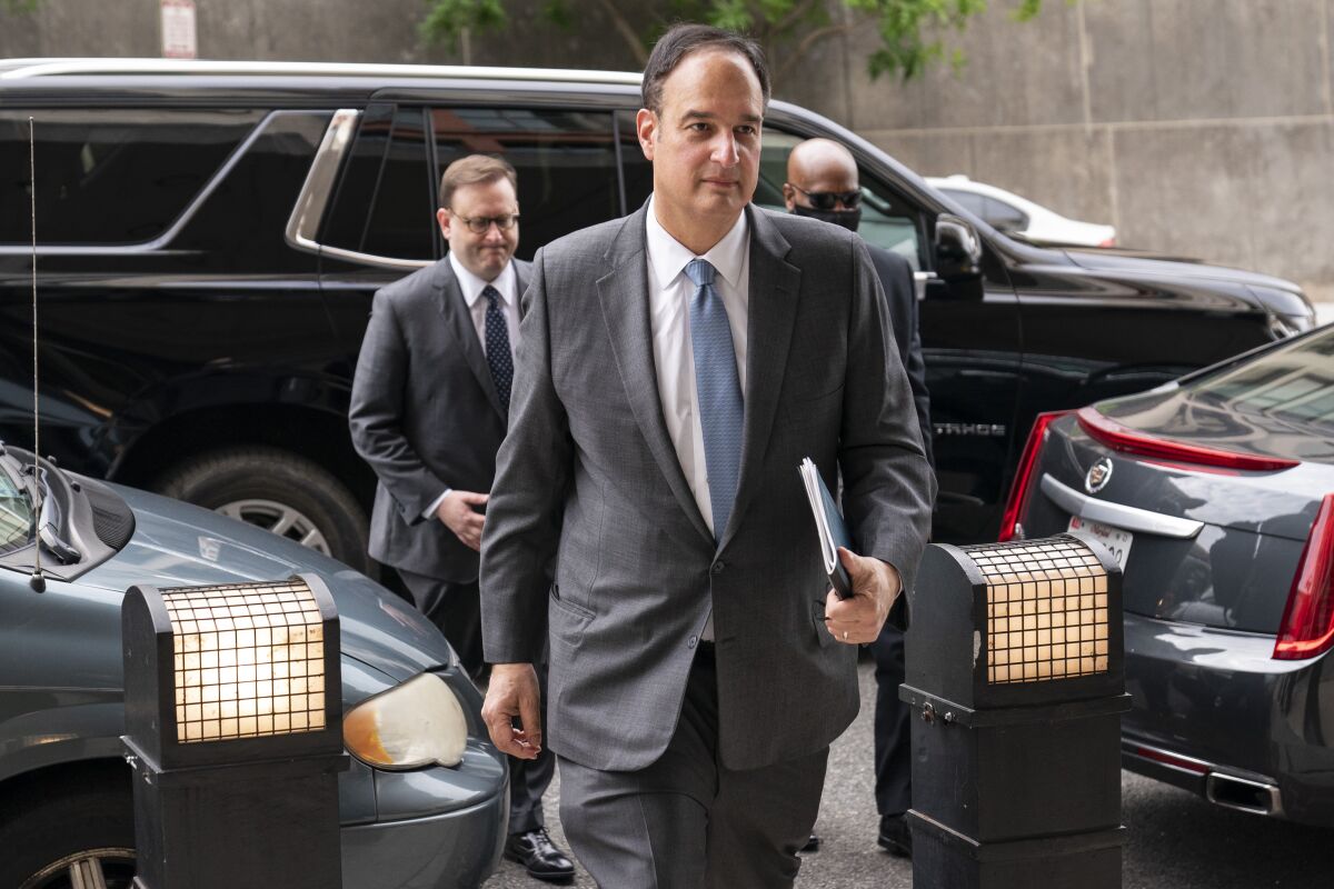 Michael Sussmann, a cybersecurity lawyer who represented the Hillary Clinton presidential campaign in 2016, arrives to the E. Barrett Prettyman Federal Courthouse, Monday, May 16, 2022, in Washington. Sussmann is accused of making a false statement to the FBI during the Trump-Russia probe. (AP Photo/Evan Vucci)