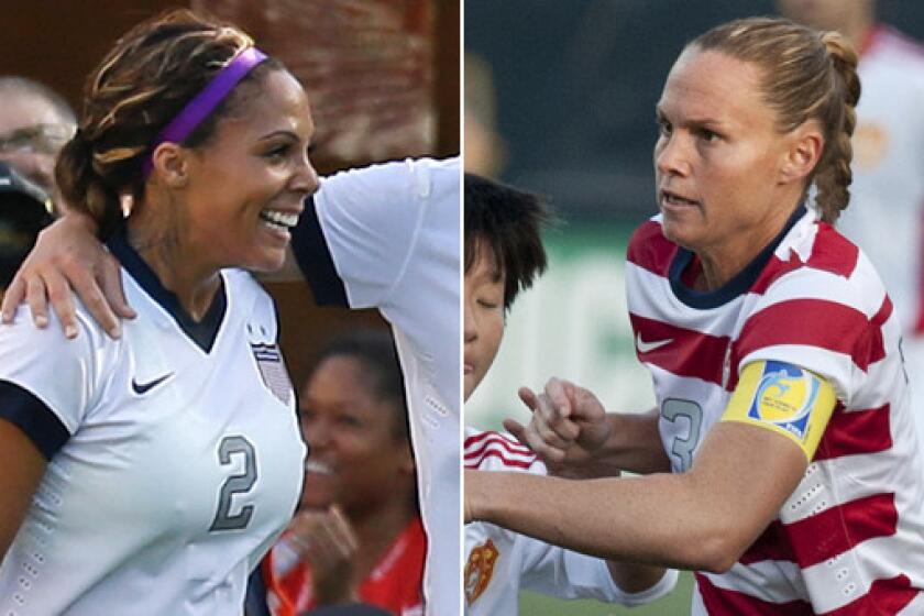 U.S. women's national team players Sydney Leroux, left, and Christie Rampone have learned from one another while practicing together in training camp this month.