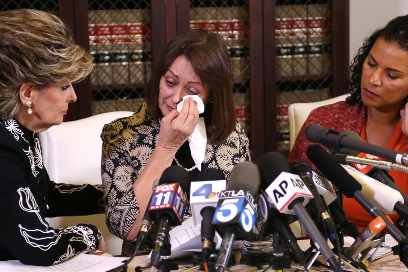 Linda Brown, center, and Lise-Lotte Lublin, right, during a news conference with attorney Gloria Allred, left, on Thursday. The two former models are the latest women to accuse entertainer Bill Cosby of sexual assault.