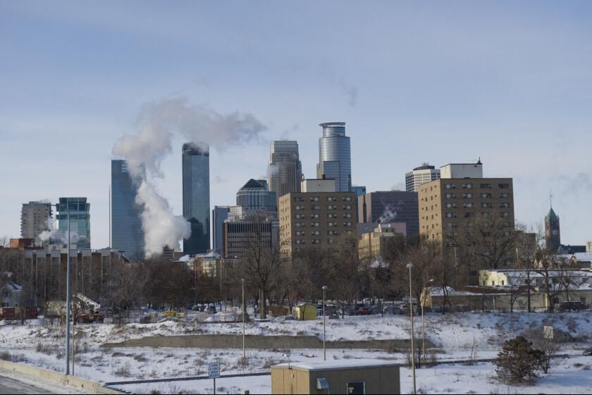 MINNEAPOLIS, MN - JANUARY 6: A view of downtown as the area deals with record breaking freezing weather January 6, 2014 in Minneapolis, Minnesota. A large area of low pressure is sweeping across the Northern U.S. and with it brings dangerously cold temperatures that have not been felt in close to 20 years. It is expected to move northward back over Canada toward the end of the week. (Photo by Stephen Maturen/Getty Images) ORG XMIT: 461306321