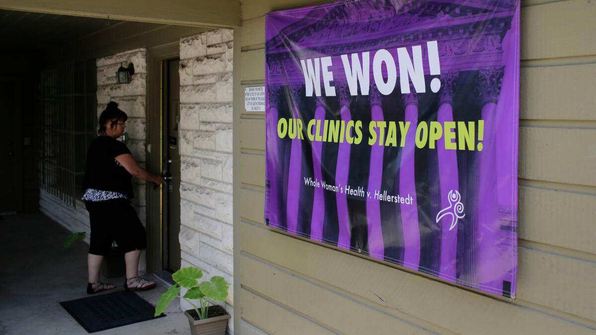 A woman enters Choice Clinic, formerly Whole Woman's Health Clinic, on June 27 in Austin, Texas.