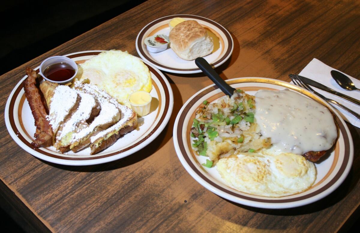A restaurant in Britain is serving up an 8,000-calorie meal. Pictured are a couple of breakfast offerings from Dick Church's in Costa Mesa.