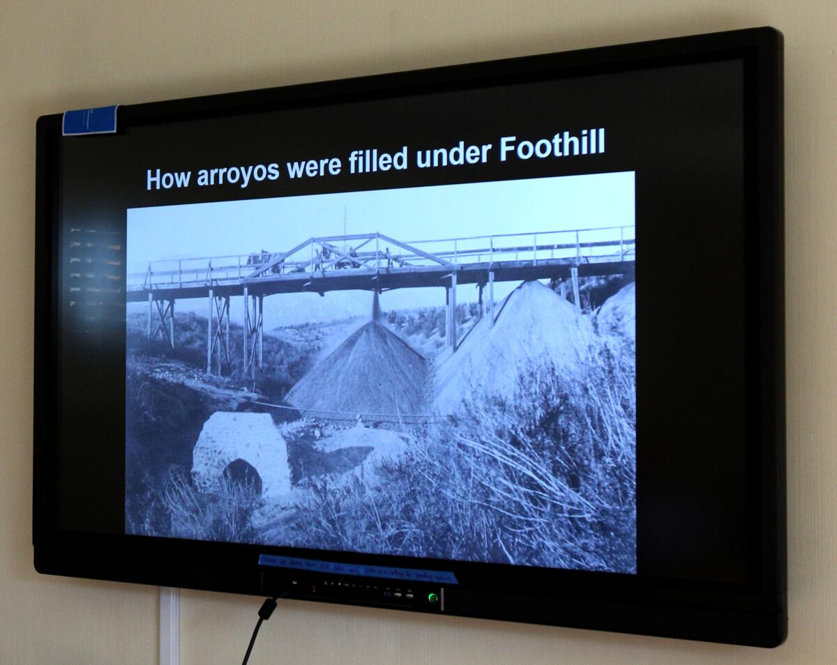 A slideshow presentation portrays how natural canyons under what's now Foothill Boulevard were filled in, including the area surrounding a roadway subsidence that's the subject of a dispute between the city and Foothill Municpal Water District.