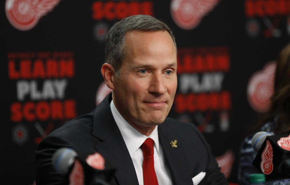 Detroit Tigers owner Christopher Ilitch attends a news conference.