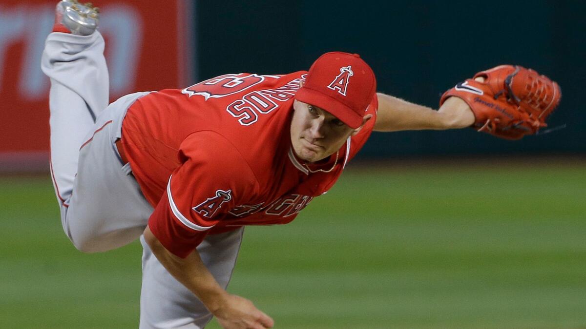 Angels pitcher Garrett Richards has not played catch since he was diagnosed last week with what the team called a strained bicep.