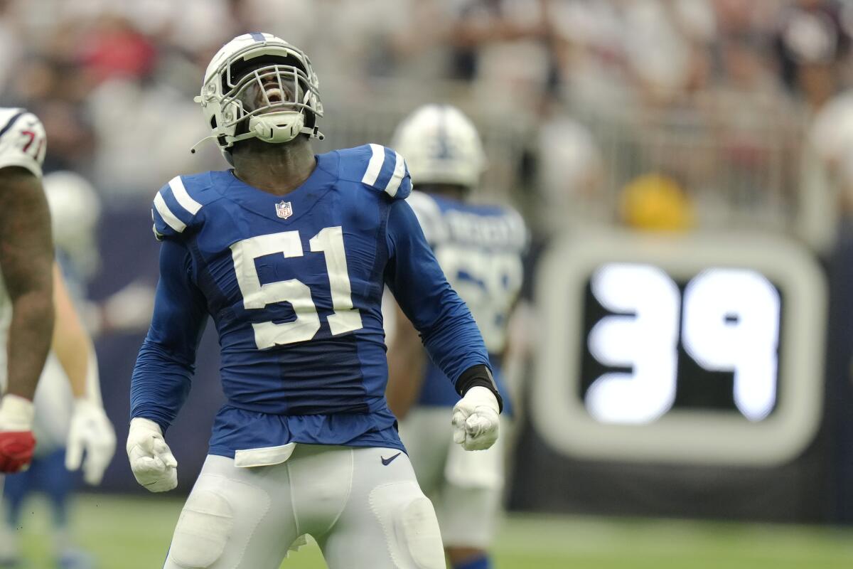 See different Indianapolis Colts uniforms throughout the years