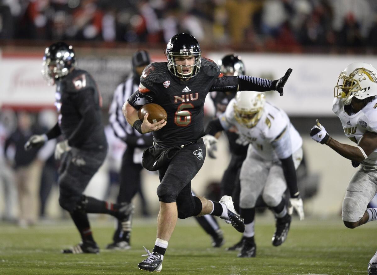 Northern Illinois quarterback Jordan Lynch scores on a 37-yard touchdown run during a win over Western Michigan on Tuesday.
