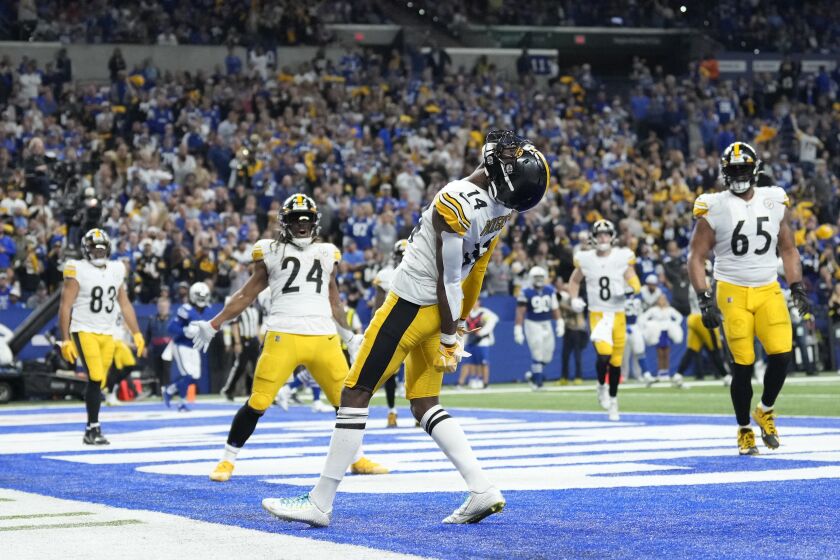 Pittsburgh Steelers' George Pickens (14) reacts after catching a two-point conversion during the second half of an NFL football game against the Indianapolis Colts, Monday, Nov. 28, 2022, in Indianapolis. (AP Photo/AJ Mast)