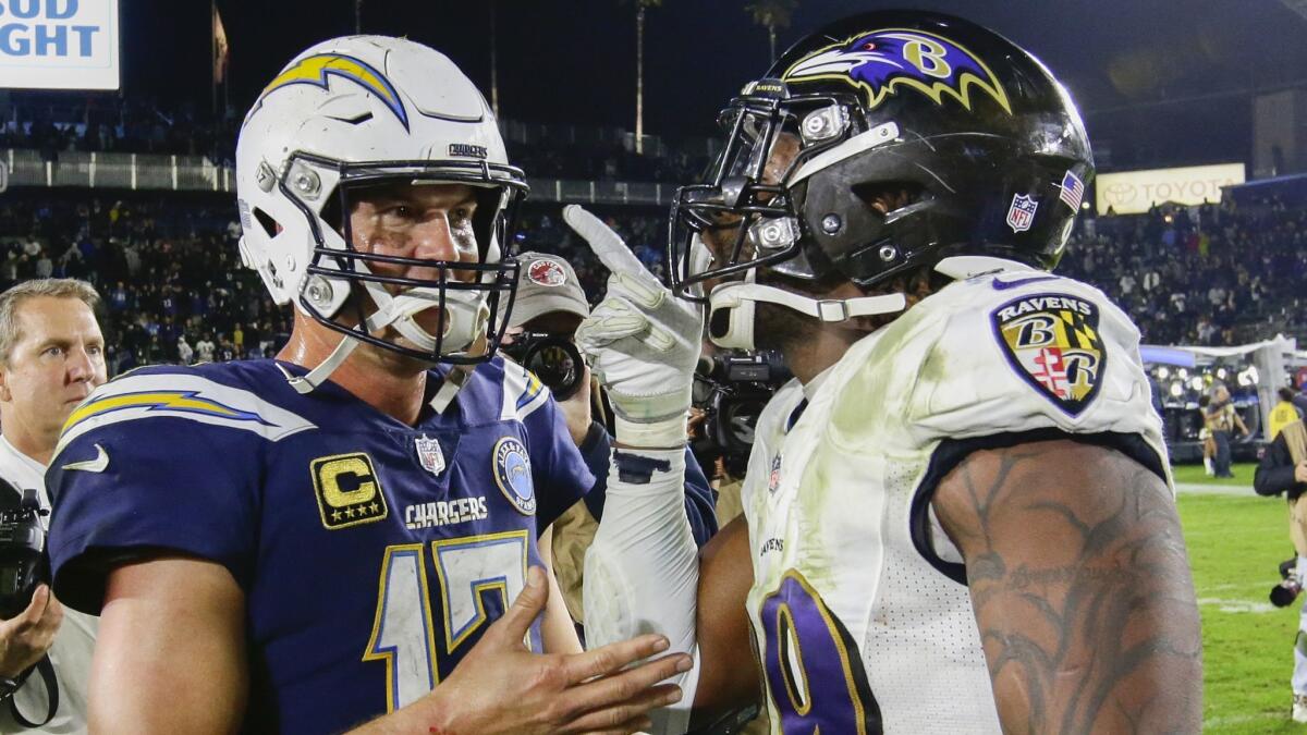 Ravens linebacker Matthew Judon gives Chargers quarterback Philip Rivers an earful of taunting after the Ravens defeated the Chargers 22-10.