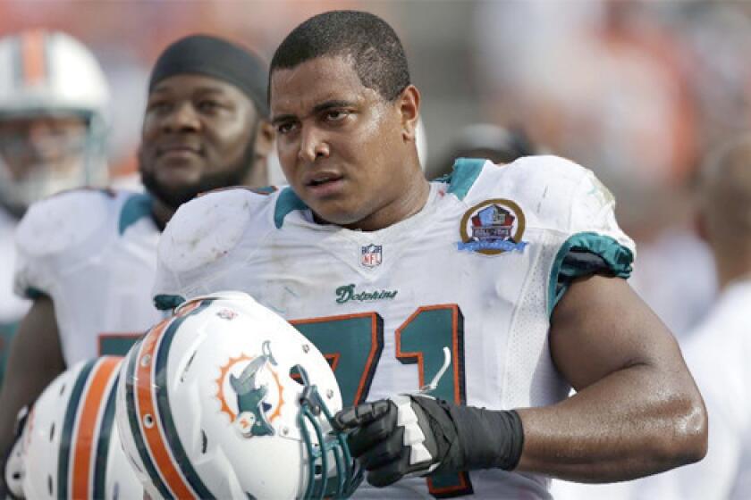 A meeting scheduled to take place between Miami Dolphins owner Stephen Ross and offensive lineman Jonathan Martin has been postponed at the request of the NFL and independent investigator Ted Wells, who is looking into the situation between Martin and teammate Richie Incognito.
