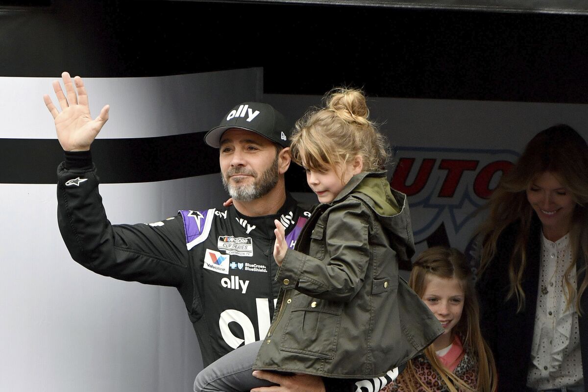 Jimmie Johnson is shown with his family before the Auto Club 400 on March 1, 2020, in Fontana.