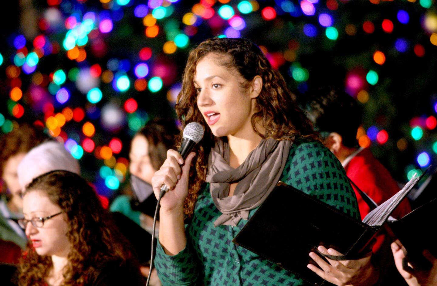 Erica McNeil and the rest of the Nestlé Choir sang Christmas songs at the tree lighting ceremony at Perkins Plaza in Glendale on Wednesday, Dec. 2, 2015.