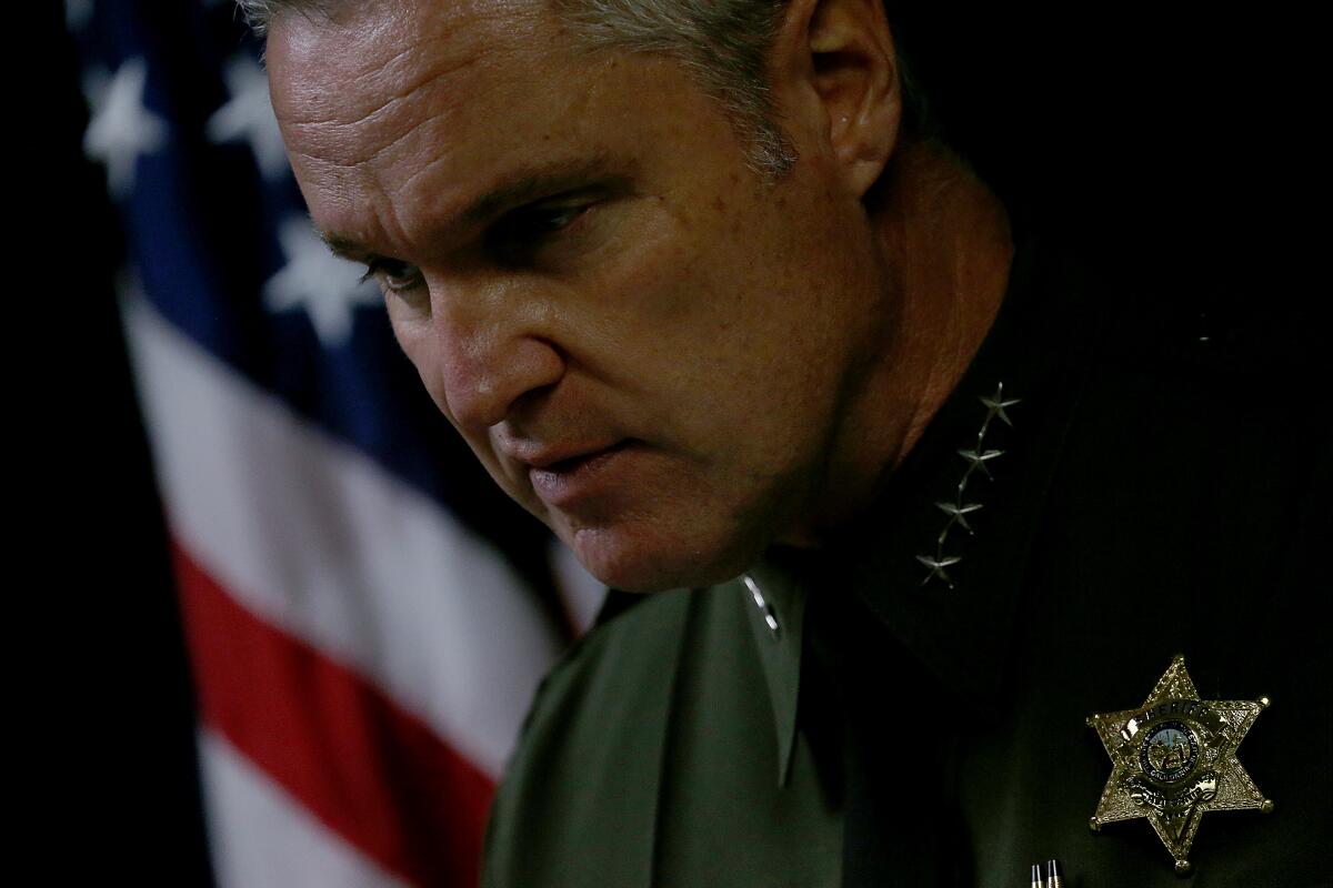 Orange County Sheriff Don Barnes speaks during a media briefing.