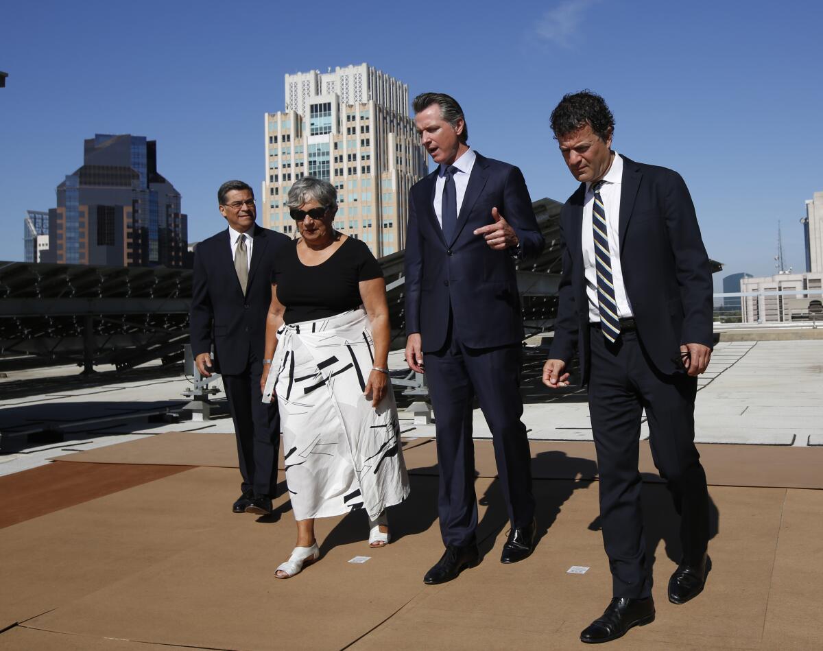 Among the California officials facing down the president will be state Atty. Gen. Xavier Becerra, left, California Air Resources Board Chairwoman Mary Nichols, Gov. Gavin Newsom and  California EPA Director Jared Blumenfeld.