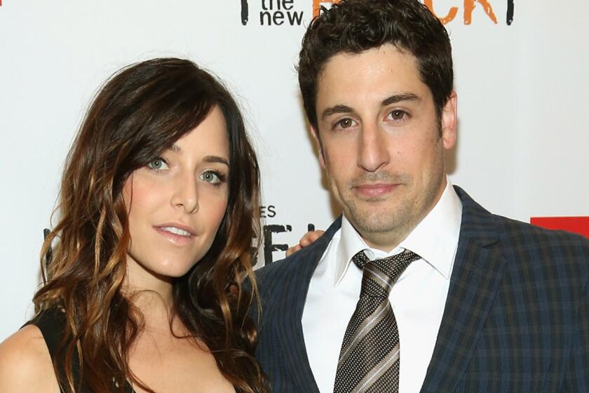 Jenny Mollen and Jason Biggs, shown at the New York premiere of "Orange Is the New Black" last June, have announced the birth of their son, Sid.
