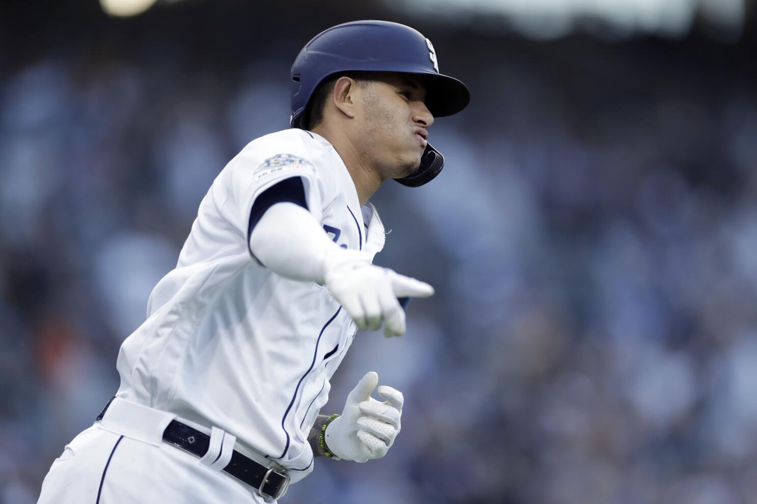 Padres slugger Manny Machado exits game after getting hit by pitch on left  hand