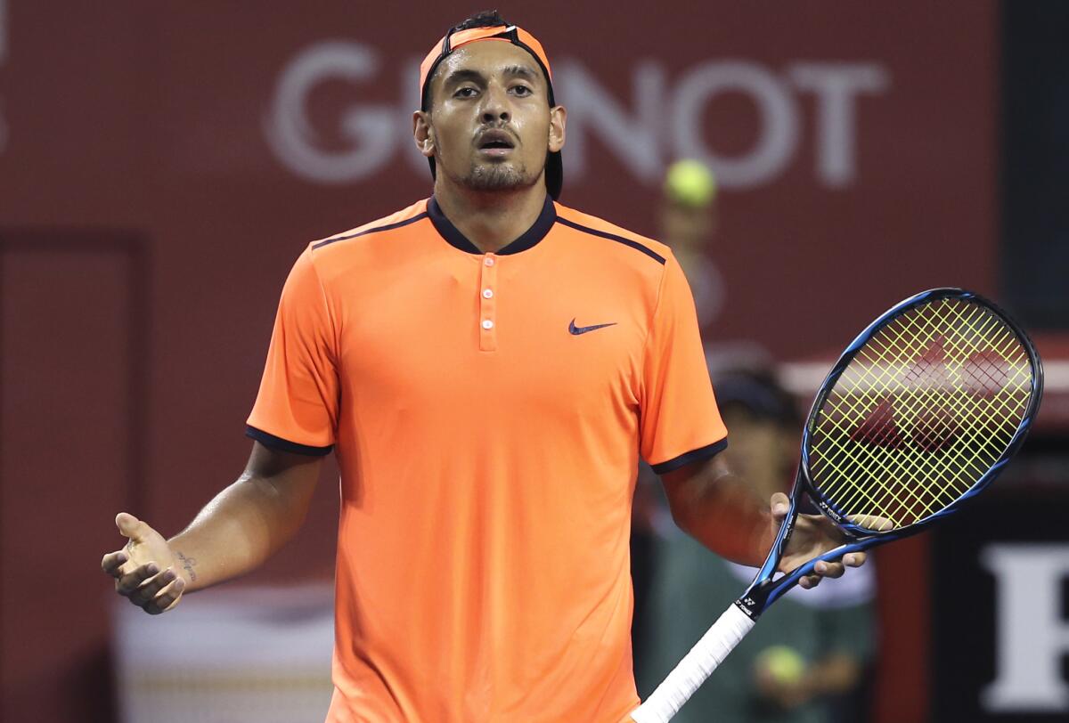 Nick Kyrgios reacts after getting a point against Gael Monfils during the semifinal match at the Japan Open on Oct. 8.