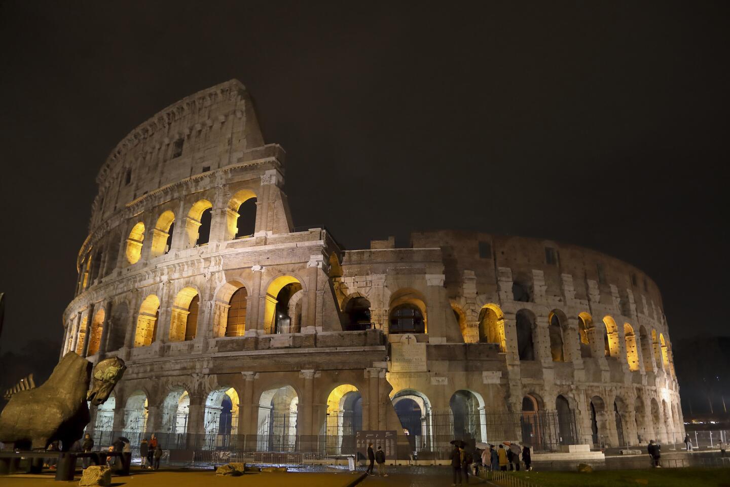 The Colosseum, also known as the The Flavian Amphitheatre, is in the center of Rome. It is shown illumintated at night Jan. 2.