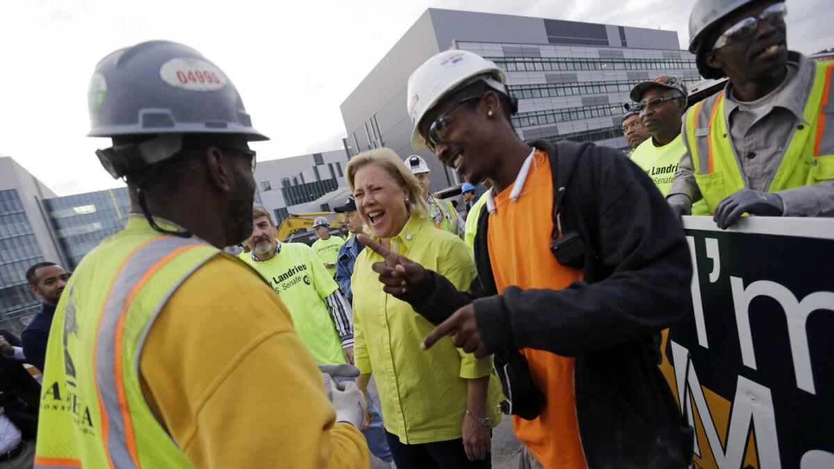 Sen. Mary L. Landrieu of Louisiana campaigns for reelection at a construction site in New Orleans on Nov. 4.