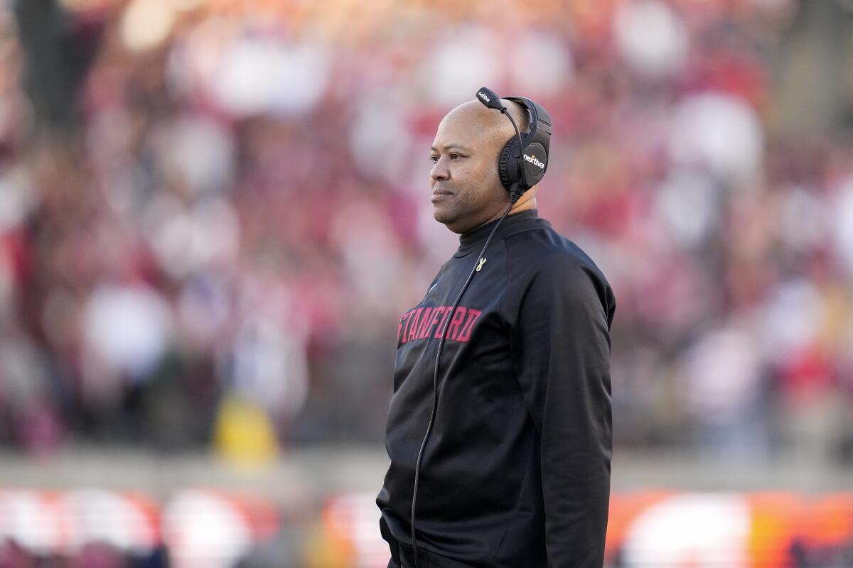 Stanford coach David Shaw stands on the sideline and watches his team play against California in Berkeley