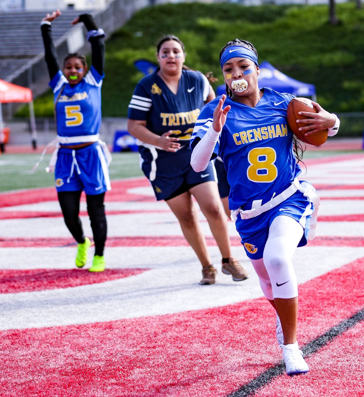 Crenshaw High's De'Chelle Bracket takes off down the sideline during a League of Champions game.