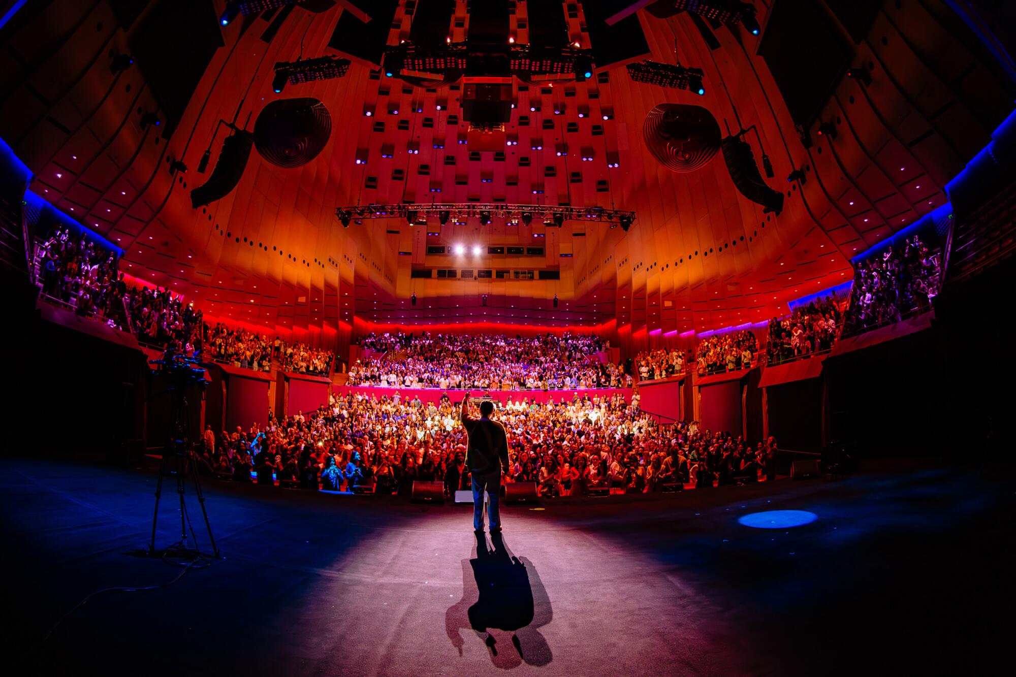 Shetty speaks to an audience at the Sydney Opera House during his 2023 "Love Rules" tour.