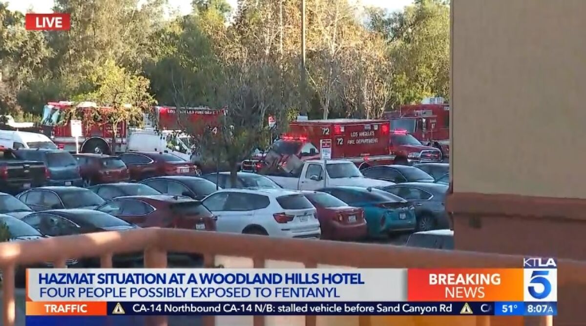 Los Angeles fire officials responded to a hotel Tuesday morning in Woodland Hills after four people were possibly exposed to fentanyl.