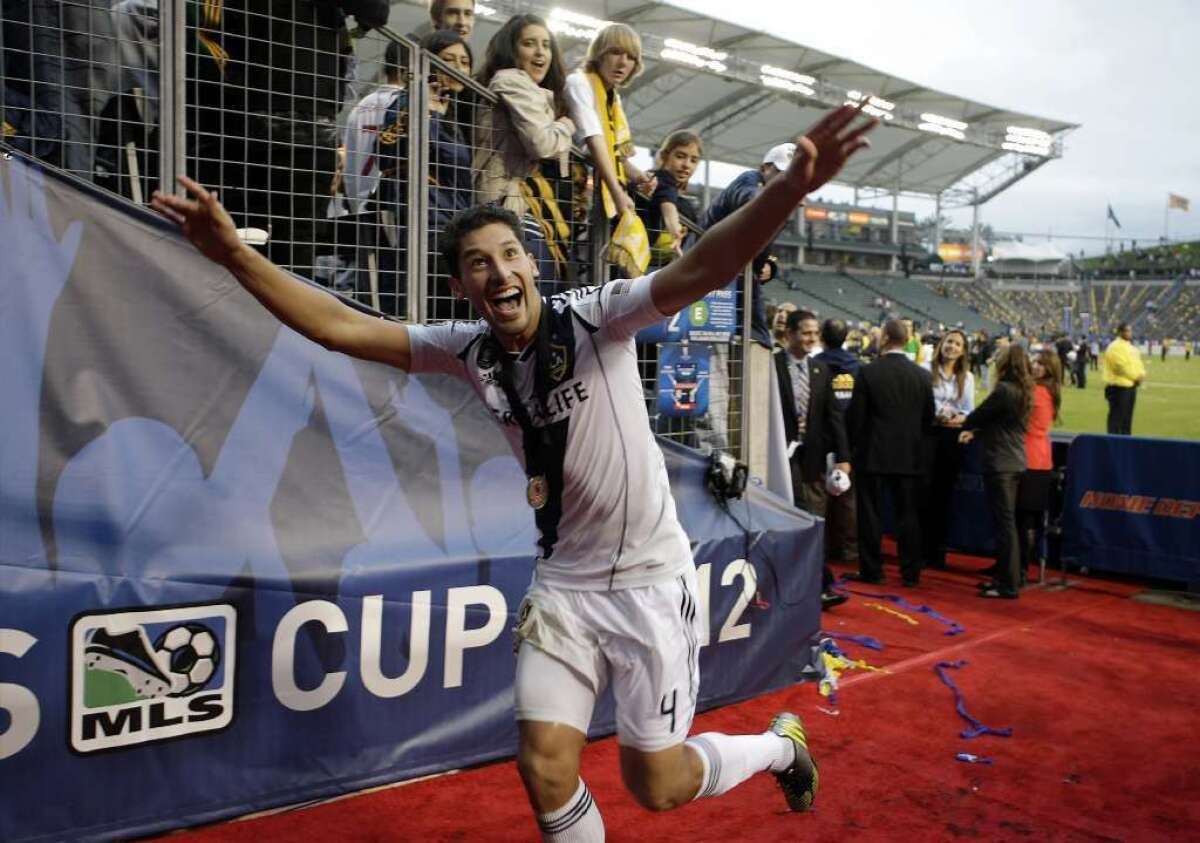 Galaxy defender Omar Gonzalez leaves the field after the Galaxy defeated the Houston Dynamo, 3-1, to win the in the MLS championship.