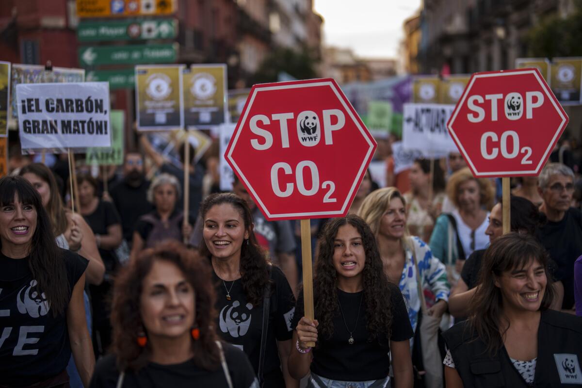 People calling for action on climate change take part in a protest in Madrid on Sept. 15.