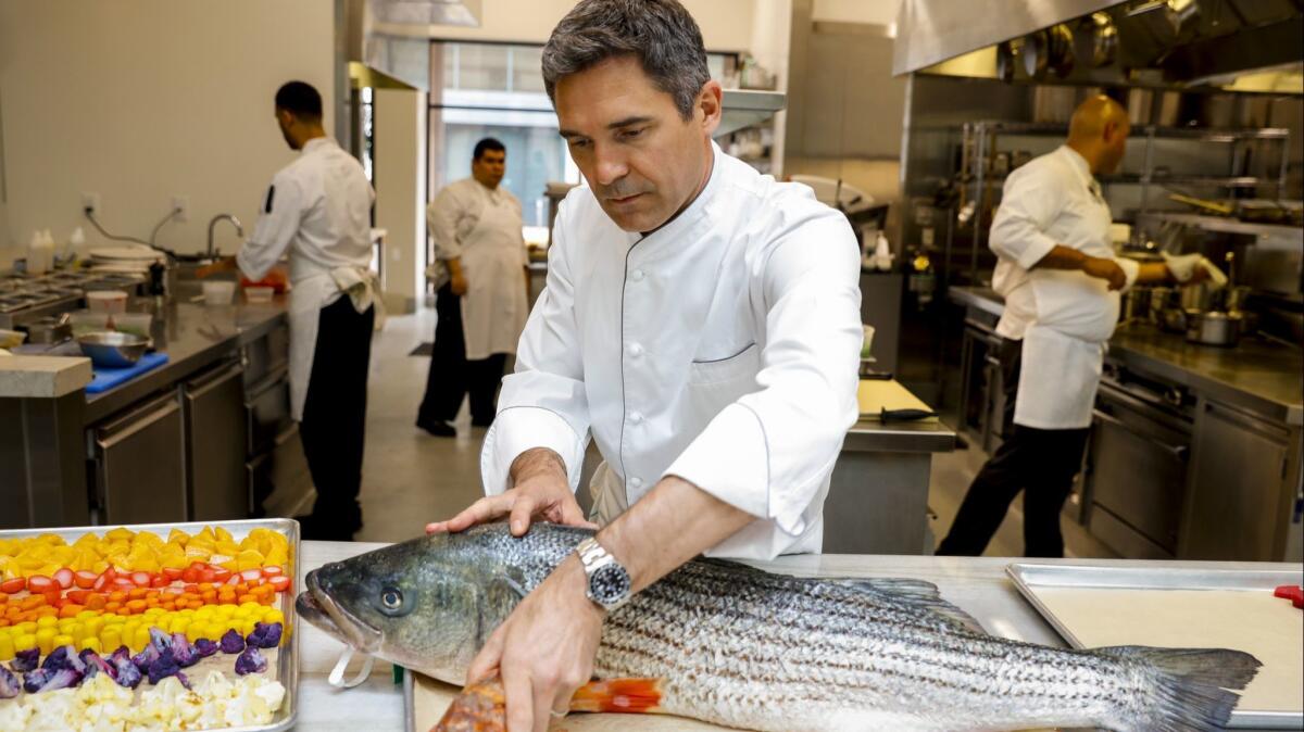 Chef Tony Esnault looks over the day's catch at the downtown Los Angeles restaurant Spring.