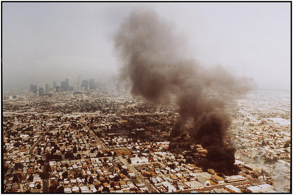 Fires burn out of control on the second day of rioting in Los Angeles following announcement of the Rodney King verdicts.