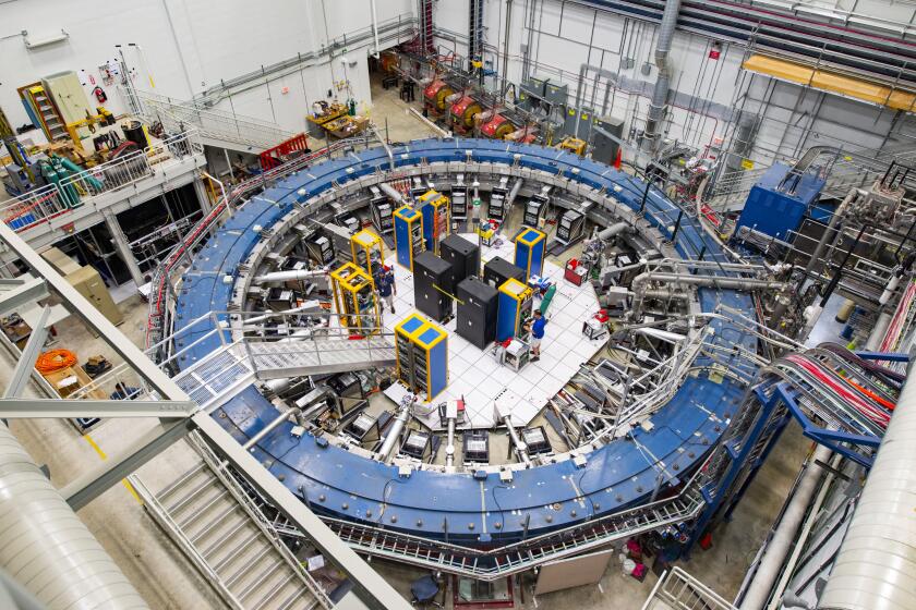 The Muon g-2 ring at the Fermi National Accelerator Laboratory outside of Chicago. It is designed to detect the wobble of muons as they travel through a magnetic field. 