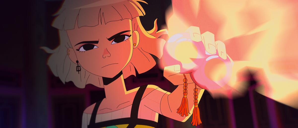 a girl holding up an object that is shining with energy