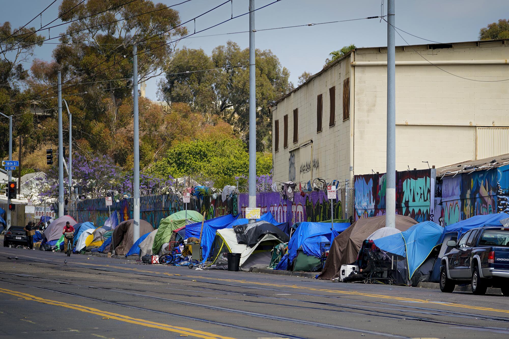 Tents line a street in downtown San Diego.