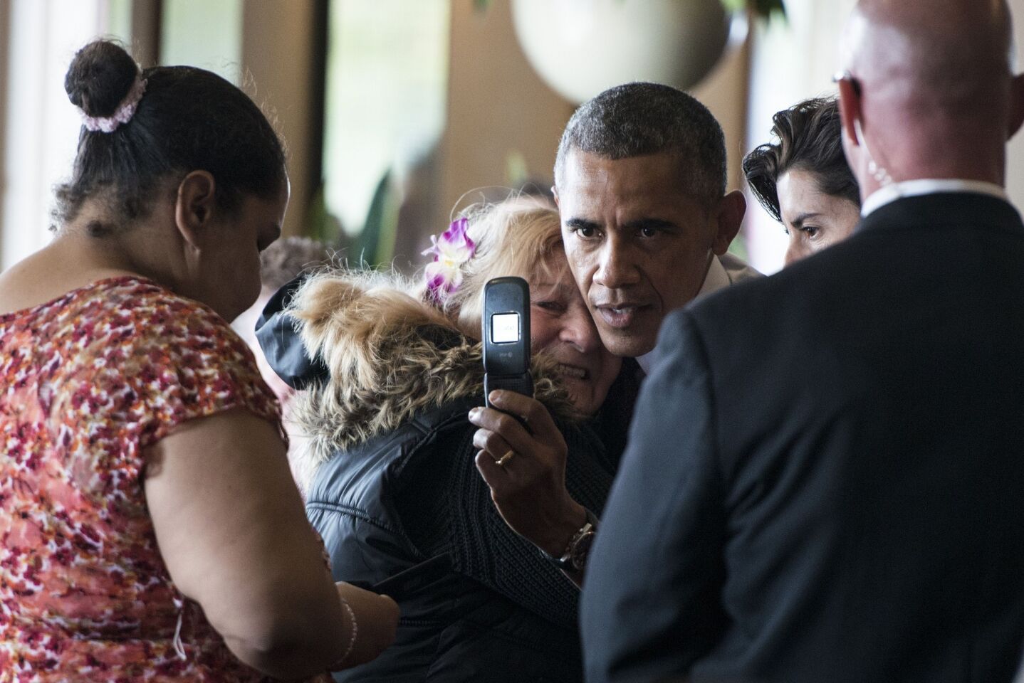 President Obama takes a selfie with a diner at Gregg's Restaurant and Pub Oct. 31, 2014, in Providence, R.I.
