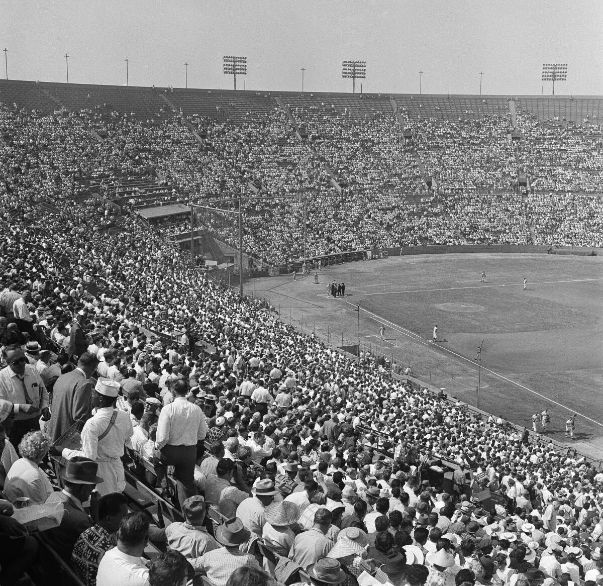 Fans take their seats at the Coliseum before Game 2 of the 1959 tiebreaker series between the Dodgers and Milwaukee Braves.
