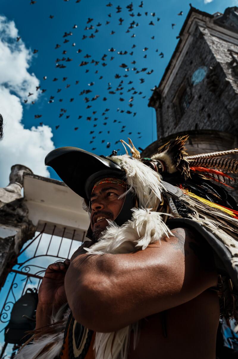 Arturo Díaz, a volador preparing to mount the pole in Cuetzalan, recalls that his introduction to the ritual years ago was "a disaster." At the top of the pole, he was paralyzed with fear.