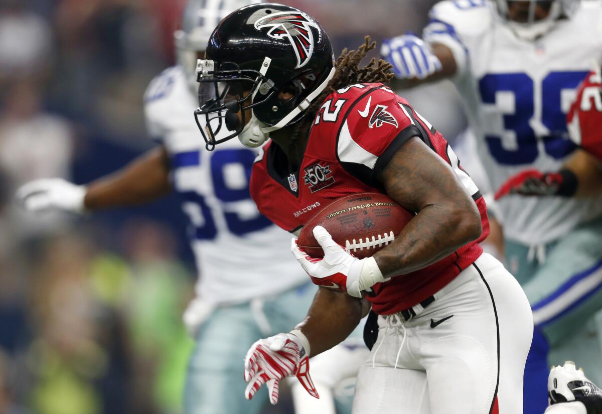 Atlanta Falcons running back Devonta Freeman sprints to the end zone for a touchdown against the Cowboys during a game on Sept. 27.