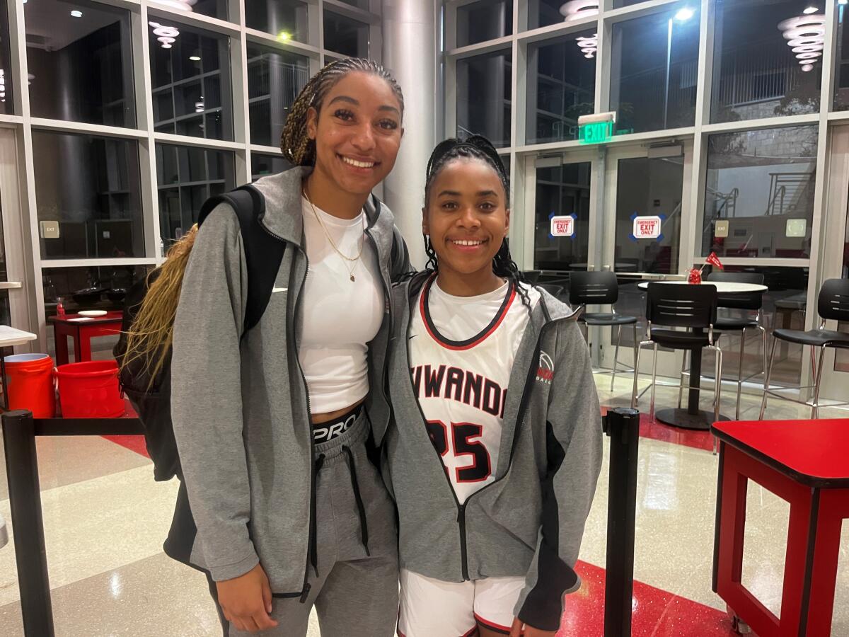 Kennedy Smith (left) and Aliyahna Morris of Etiwanda High pose for a photo.