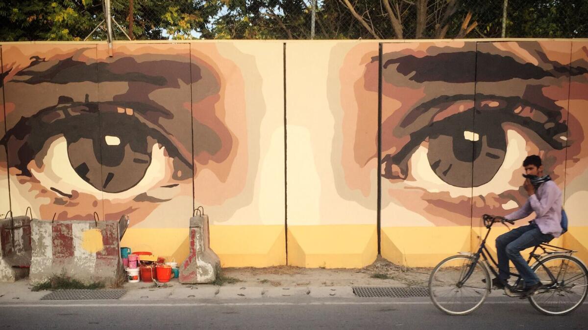 Artist Kabir Mokamel says the eyes staring out into the city are meant to encourage people to confront the things that often stay hidden in Afghanistan’s capital.