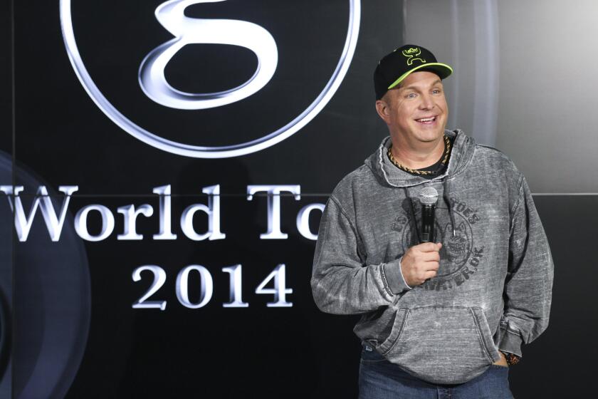 Garth Brooks, speaking Thursday at the Allstate Arena in Rosemont, Ill., introduces GhostTunes, a new alternative to iTunes that he said "allows artists to sell music any way they want to."