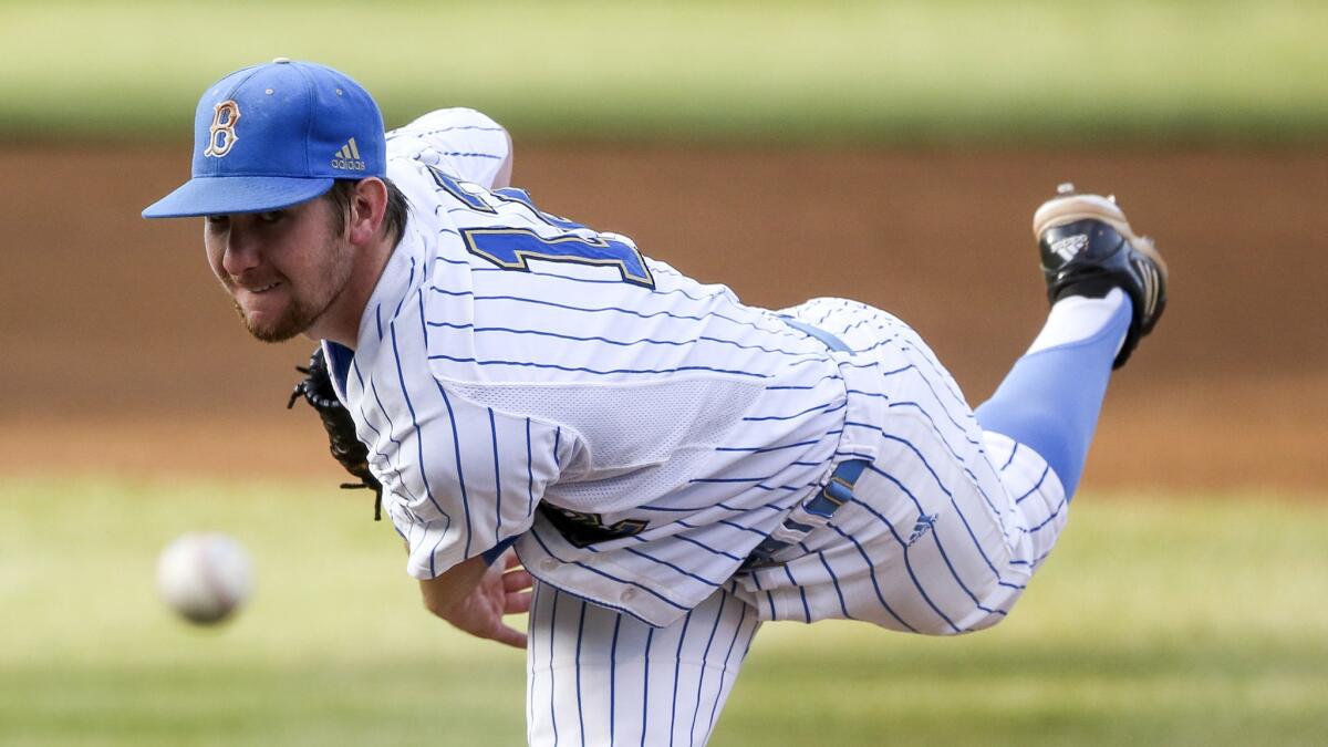 UCLA pitcher Grant Watson delivers against San Diego during the first inning.