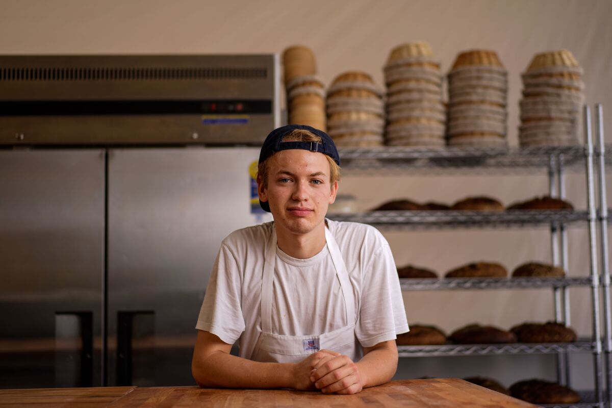 Bread baker Jyan Isaac Horwitz, 19, poses for a portrait in his shop's kitchen in Culver City.