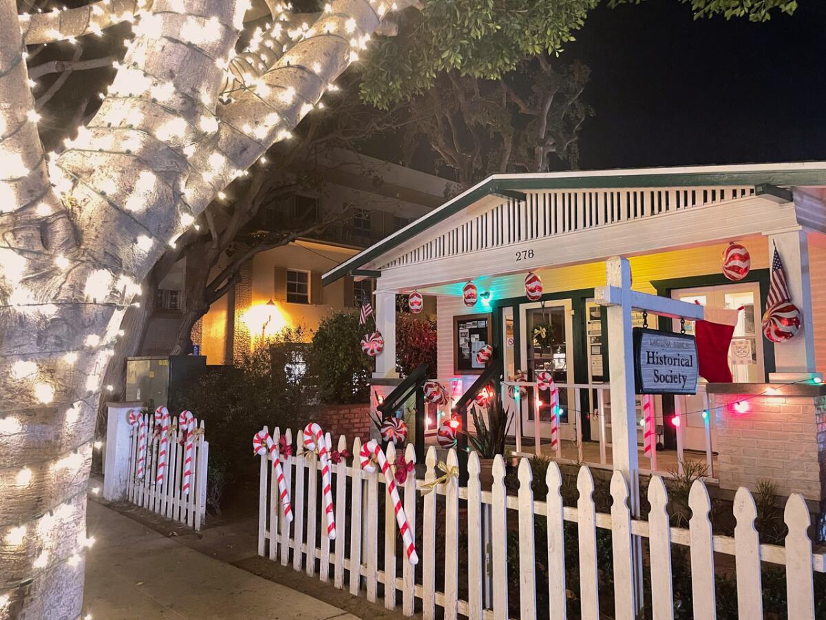 The Laguna Beach Historical Society was selected as a people's choice winner in a holiday window decoration contest.