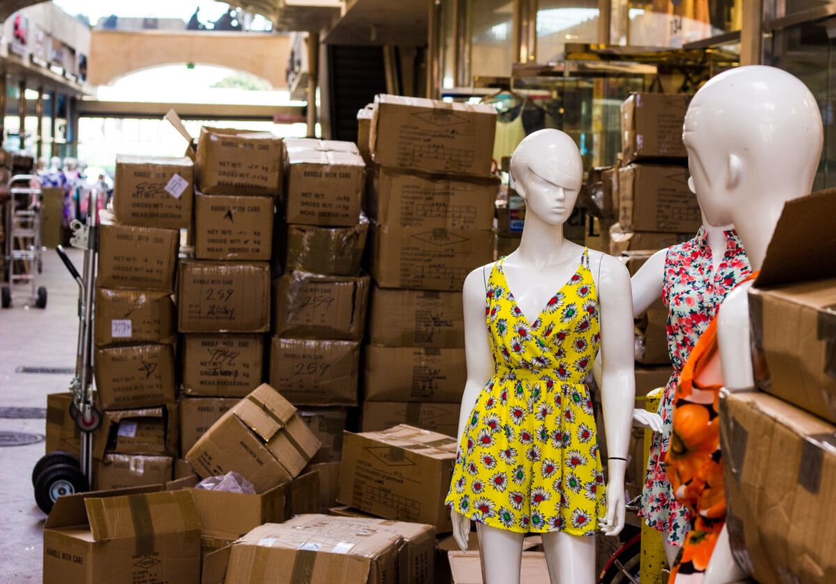 Mannequins and boxes packed with garments in the L.A. Fashion District.