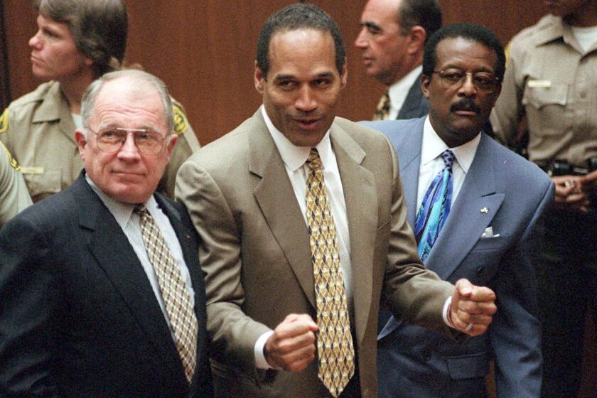 O.J. Simpson reacts as he is found not guilty in the death of his ex-wife Nicole Brown Simpson.