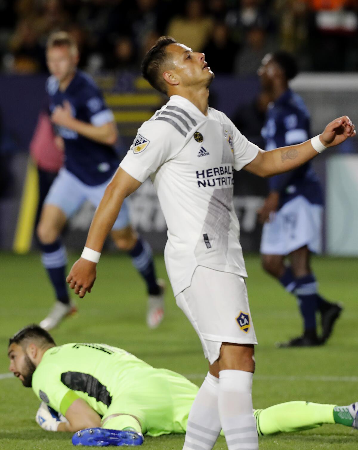 Javier "Chicharito" Hernandez reacts after Vancouver goalie Maxime Crepeau makes a save during the first half of a game on March 7, 2020, at Dignity Health Sports Park.
